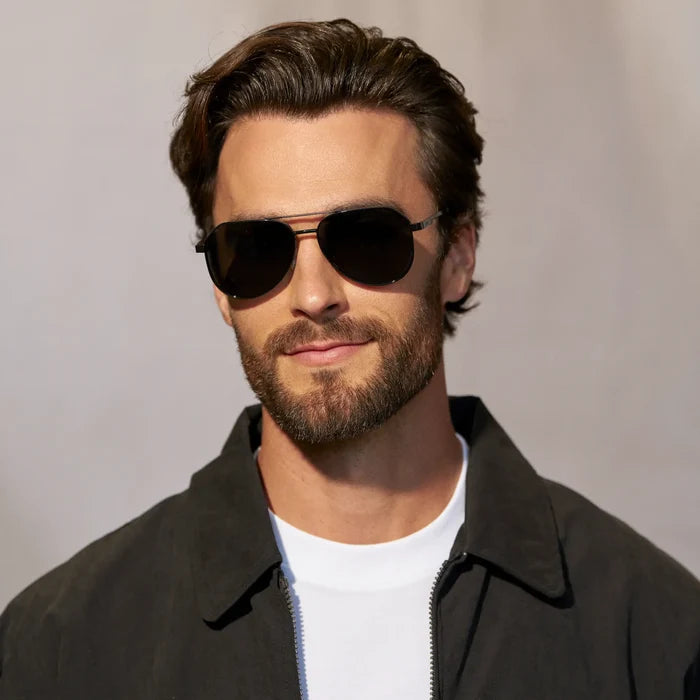 Black / Triple Black Lens || Model wearing Men's Stainless Steel Aviator Sunglasses with Black Frame and Triple Black Lens