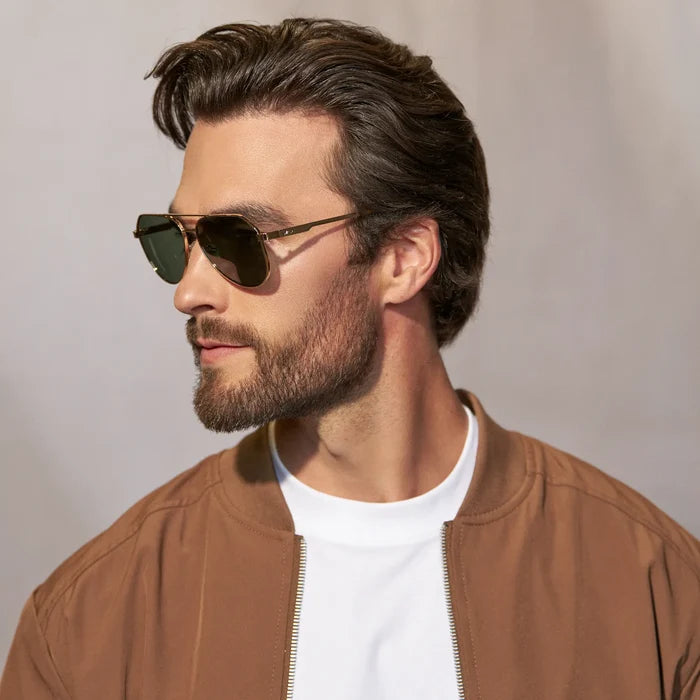 Gold / Smoke Green Lens || Model wearing Men's Stainless Steel Aviator Sunglasses with Gold Frame and Smoke Green Lens