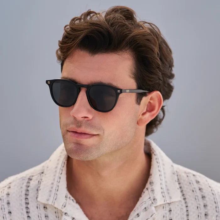 Black / Triple Black Lens || Model wearing Men's Round Polarized Sunglasses with Black Frame and Black Lenses