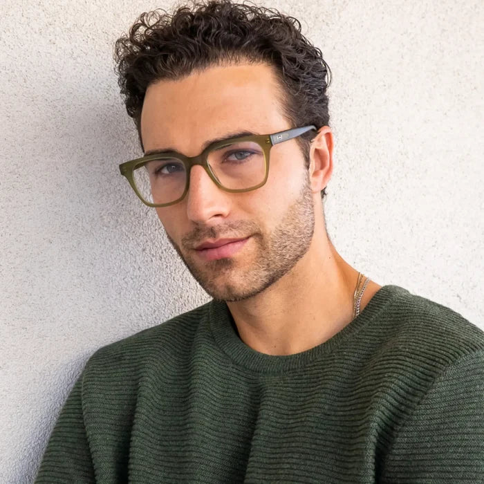 Frosted Khaki Green || Rectangular prescription glasses with matte green frame and subtle metal detailing on temples worn by man