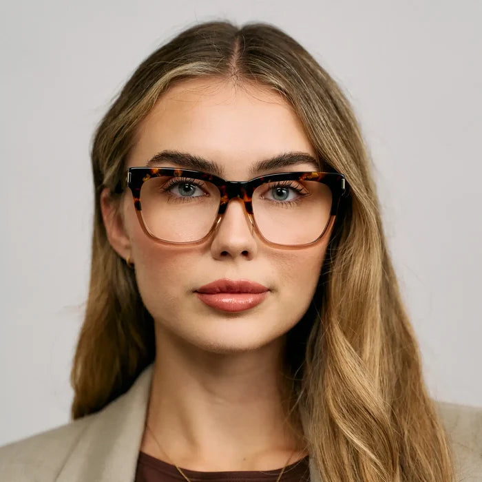 Crystal Brown Tortoise || Thick oversized square prescription eyeglasses with black frame worn by woman outdoors in natural light