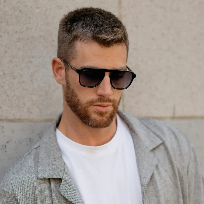 Black Beige Tort / Grey Lens || Single Bridge Aviator modern prescription sunglasses with black frame and grey lenses worn by man outdoors