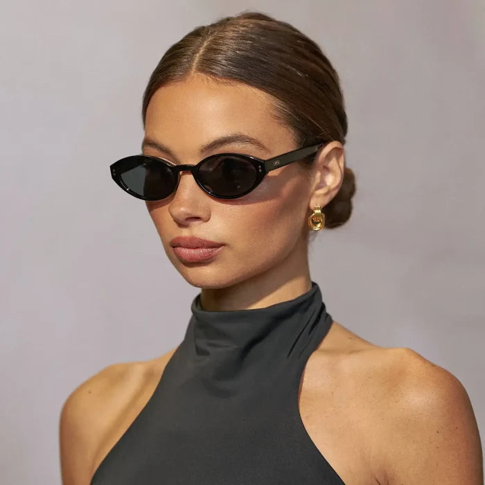 Black / Triple Black Lens || Woman wearing Elongated Oval Sunglasses with Black Frame and Black Lens
