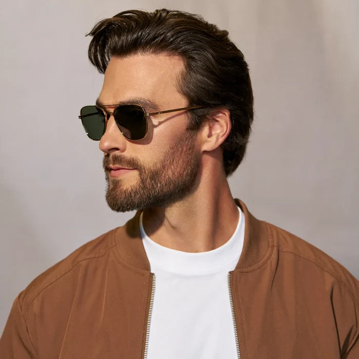 Gold / Smoke Green Lens || Model wearing Men's Stainless Steel Sunglasses with Gold Frame and Smoke Green Lens