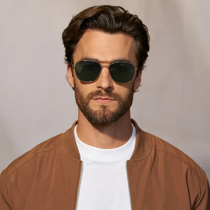 Gold / Smoke Green Lens || Model wearing Men's Stainless Steel Sunglasses with Gold Frame and Smoke Green Lens