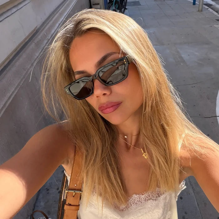 Black / Triple Black Lens || Model wearing Women's Rectangular Polarized Sunglasses with Black Frame and Black Lenses