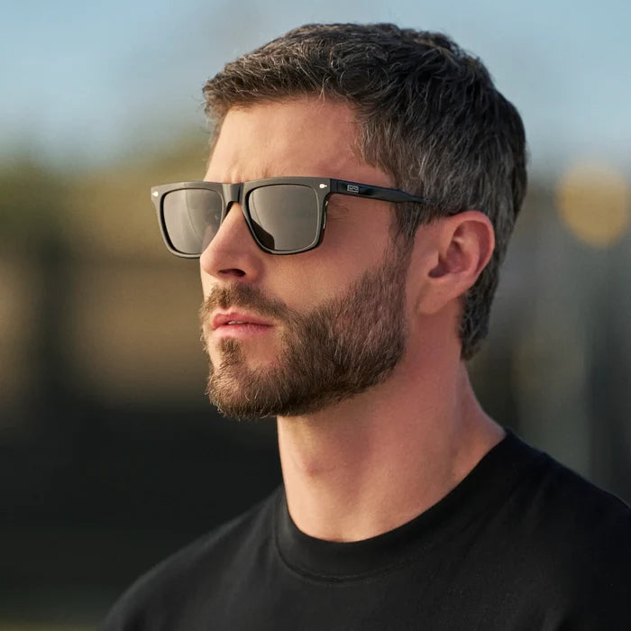 Black / Grey || Man wearing Classic Rectangular Prescription Sunglasses with Black Frame and Grey Lens outdoors
