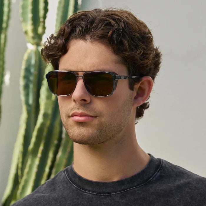 Stone Blue / Brown Lens || Man wearing Stone Blue Square Aviator Sunglasses with Brown Polarized Lenses outdoors