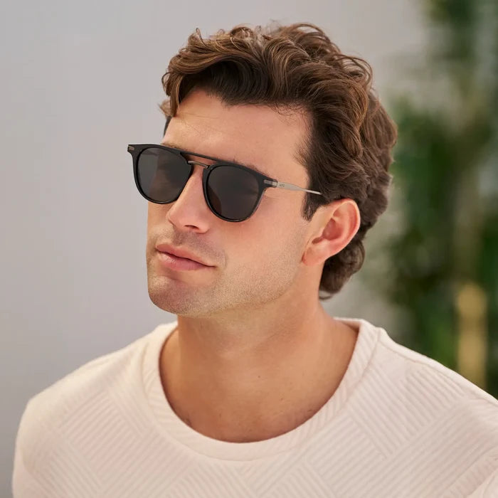 Black / Grey || Men's Round Prescription Sunglasses with Black Frame and Grey Lenses worn by a man outdoors