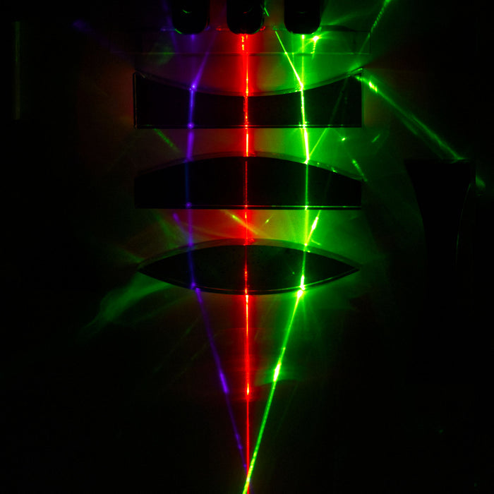 Laser Blox demonstrating focal distance through lenses on a classroom whiteboard