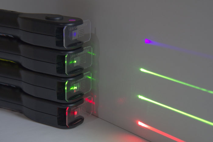 Four Laser Blox types in violet, green, and red for safe classroom use by teachers