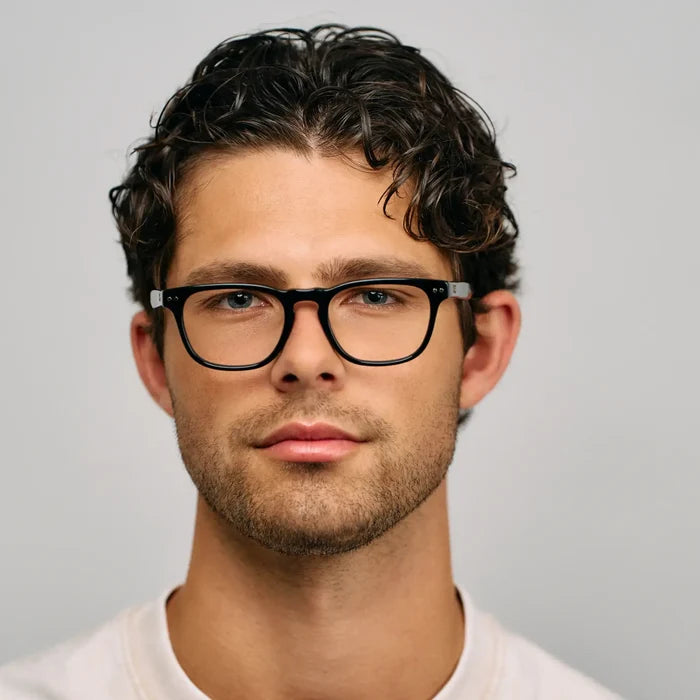 Black || Model wearing Men's Rectangular Prescription Glasses with Black Acetate Frame and Clear Lens