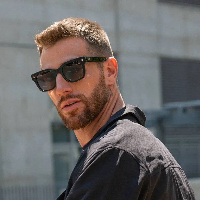 Black / Grey || Model wearing Men's Square Frame Prescription Sunglasses with Black Frame and Grey Lenses