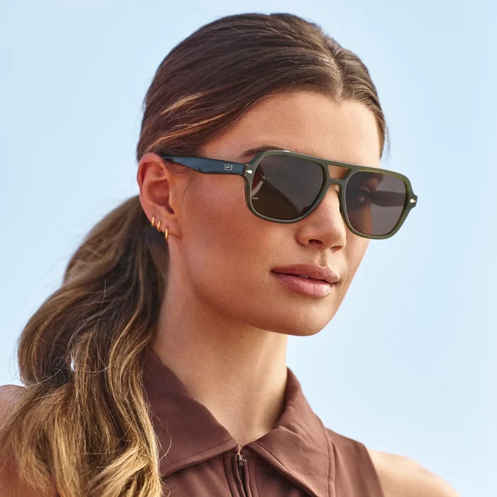 Olive Green / Brown Lens || Woman wearing Flat-Top Aviator Sunglasses with Olive Green Frame and Brown Lens in natural light