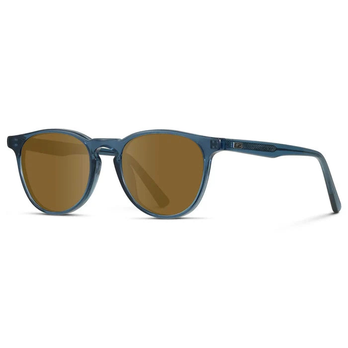 Crystal Cobalt / Amber || Side view of Men's Round Prescription Sunglasses with Crystal Cobalt Frame and Amber Lenses on a white background
