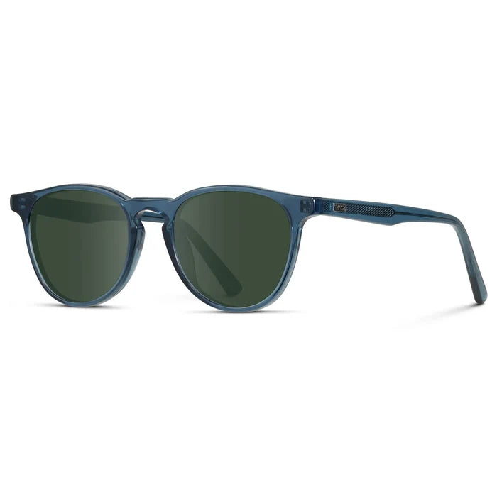 Crystal Cobalt / G15 || Side view of Men's Round Prescription Sunglasses with Crystal Cobalt Frame and Green Lenses on a white background