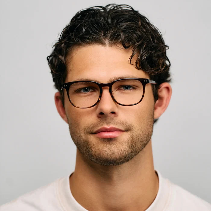 Rye Brown || Male model wearing rectangular blue light blocking glasses with Rye Brown acetate frame