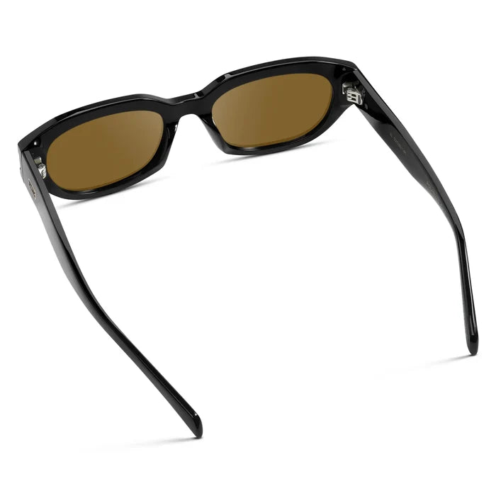 Black / Amber || Side view of Women's Oval Prescription Sunglasses with Black Frame and Amber Lenses on a white background